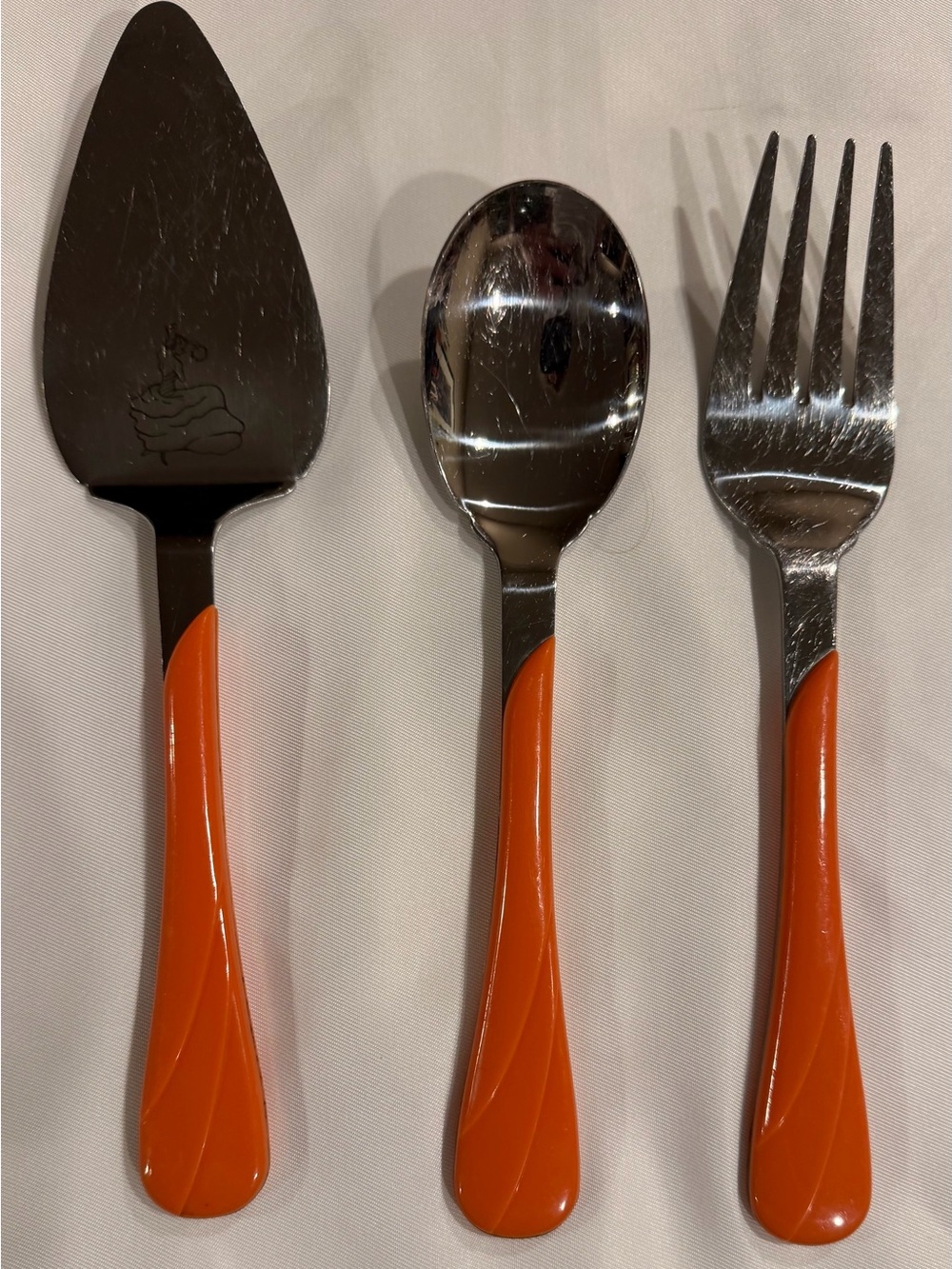 Fiesta ware 3 piece serving set, orange swirl pattern,fork/spoon/cake/pie server